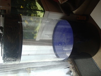 AS NEW/very large round cylinder aquarium with black base and lid approx 260ltrs as new