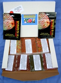 DISCUS DELIGHTS THE GOURMET FISH FOOD HAMPER. SEVEN DIFFERENT FOODS, ONE FOR EACH DAY IN EVERY PACK.